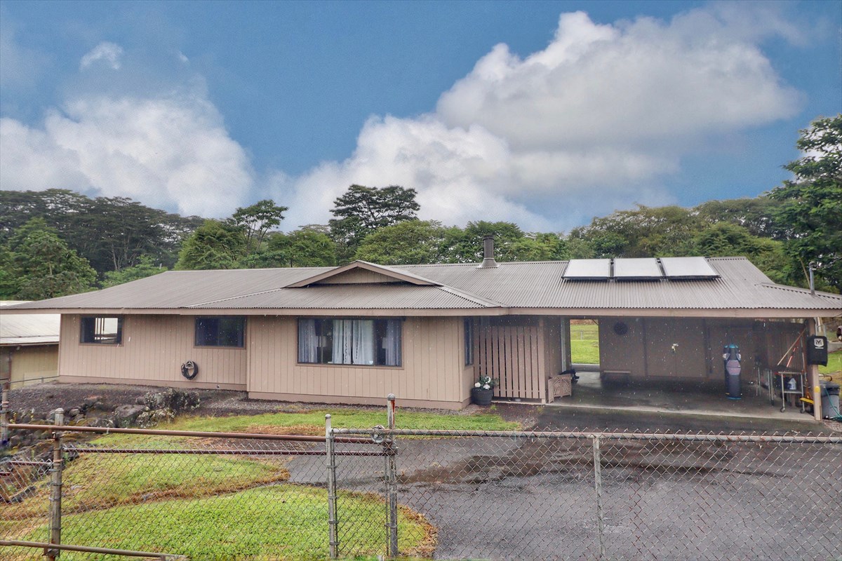 17-212 Volcano Road Keaau, HI 96749 - Photo 24 of 24 a front view of a house with garden
