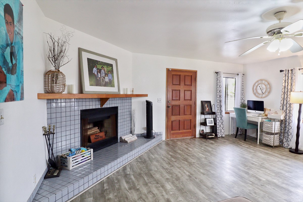 17-212 Volcano Road Keaau, HI 96749 - Photo 3 of 24 a living room with furniture and a fireplace