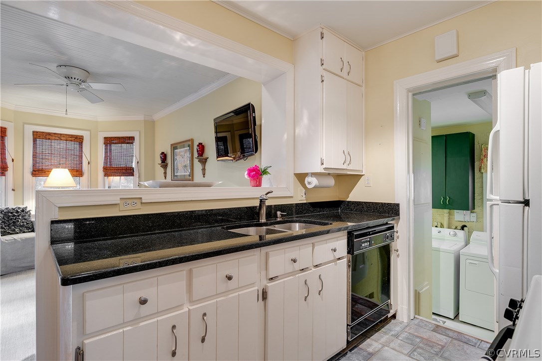 914 Pine Ridge Road Richmond, VA 23226 - Photo 16 of 39 Opens to spacious laundry room with extra storage.