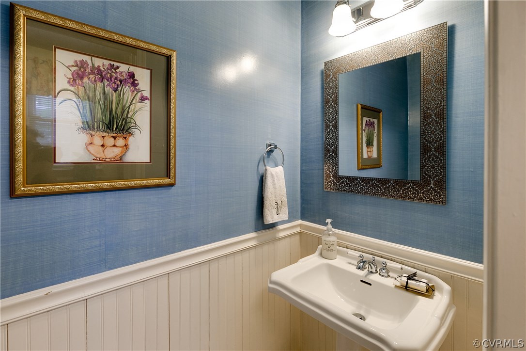 914 Pine Ridge Road Richmond, VA 23226 - Photo 21 of 39 Powder room with wainscoting.