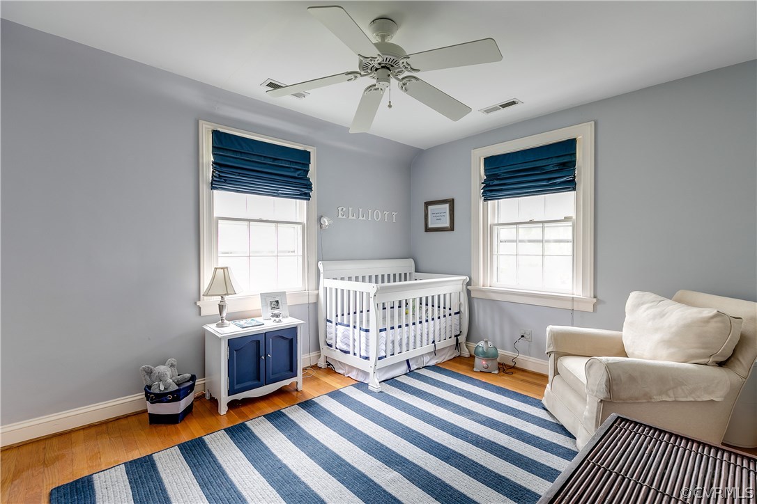 914 Pine Ridge Road Richmond, VA 23226 - Photo 28 of 39 Second bedroom with two windows, hardwood floors.