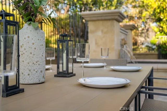 a view of a table and chairs in the patio