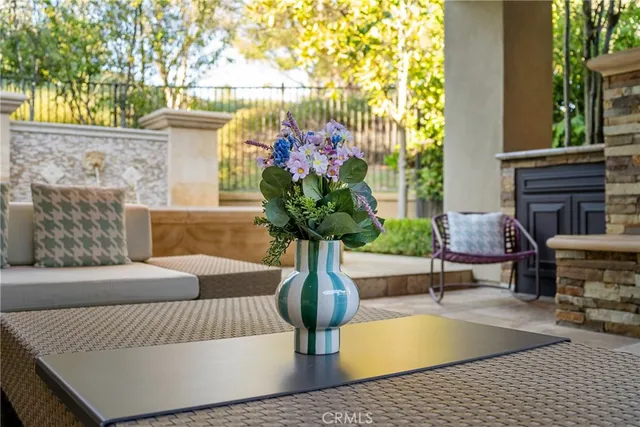 a vase of flowers sitting on a table