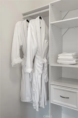 a bathroom with a shower curtain and a sink