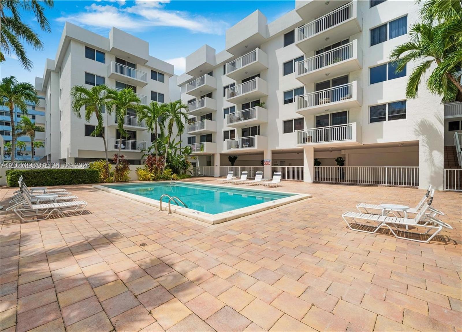 1665 Bay Road, Unit 322 Miami Beach, FL 33139 - Photo 19 of 24 a view of a building with garden