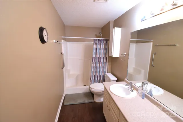 a bathroom with a sink and toilet