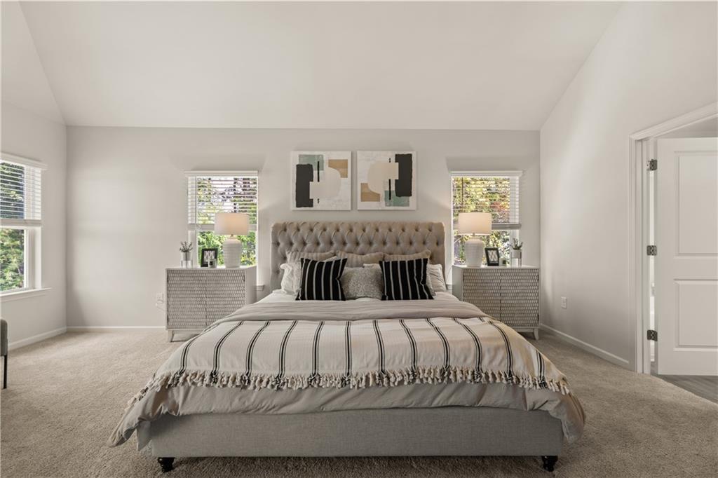 2724 Riverpine Trail Atlanta, GA 30331 - Photo 7 of 10 a bedroom with a bed and a window