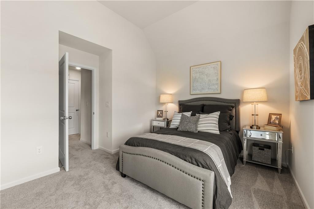 2724 Riverpine Trail Atlanta, GA 30331 - Photo 10 of 10 a bedroom with a bed and a lamp