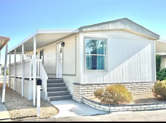 a front view of a house with wooden floor