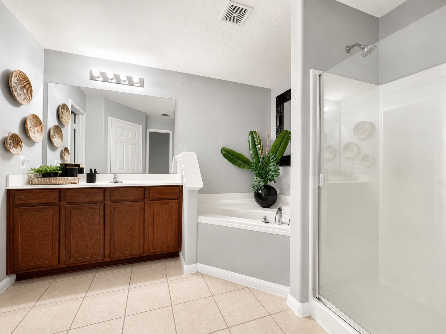 9911 Bronze Mill Lane Rosharon, TX 77583 - Photo 10 of 15 The spacious primary bath features a soaking tub, separate shower, dual vanity, and plenty of room to start and end your day comfortably.