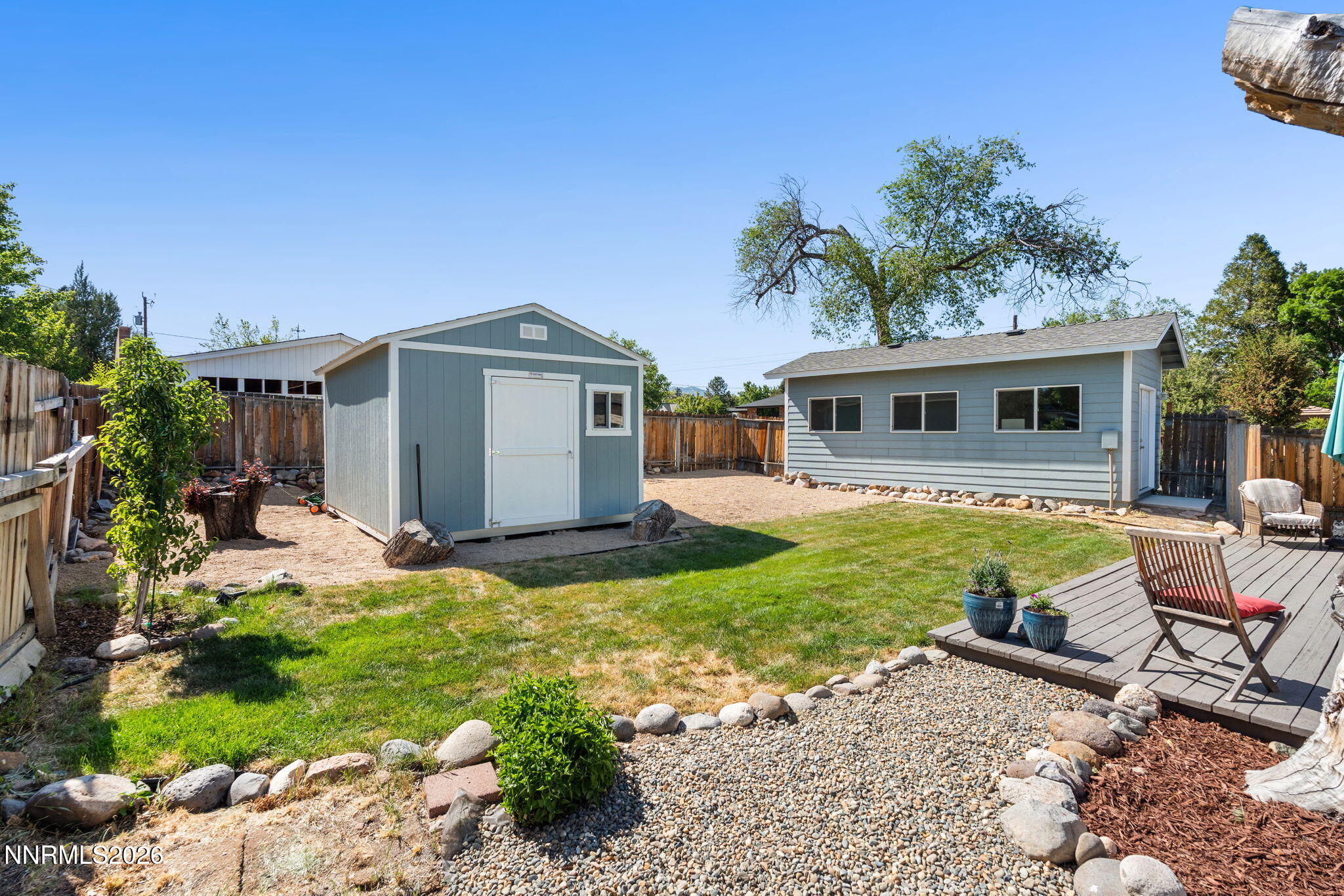 300 Country Club Drive Reno, NV 89509 - Photo 41 of 48 a view of a house with backyard sitting area and swimming pool