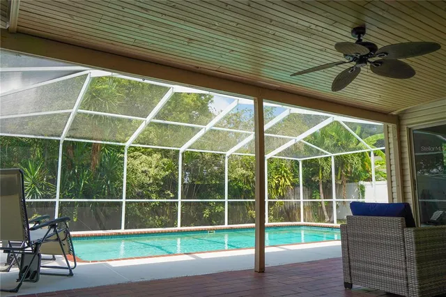 a view of a room with a large window