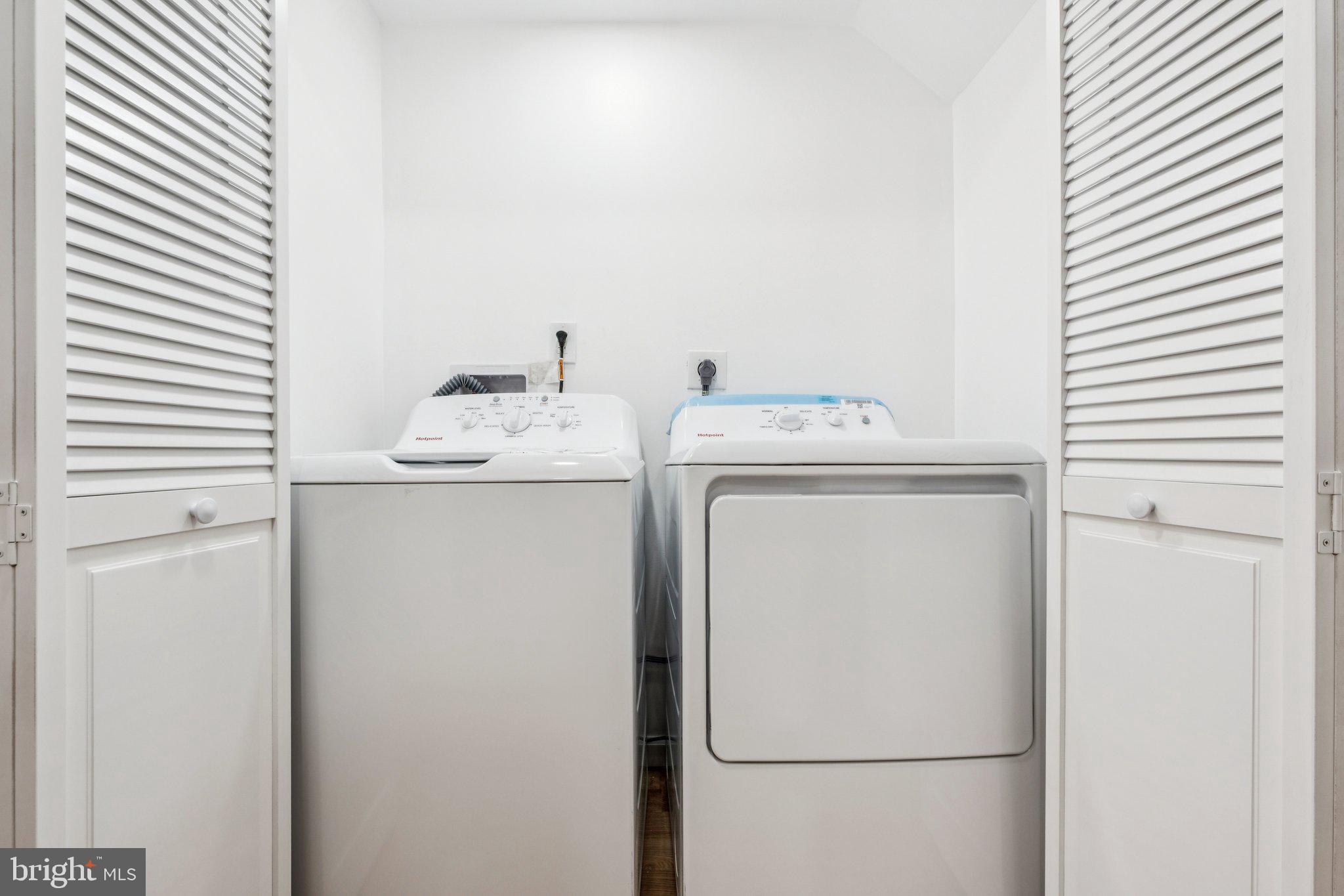 1223 Spruce Street, Unit 3F Philadelphia, PA 19107 - Photo 9 of 37 a utility room with dryer and washer
