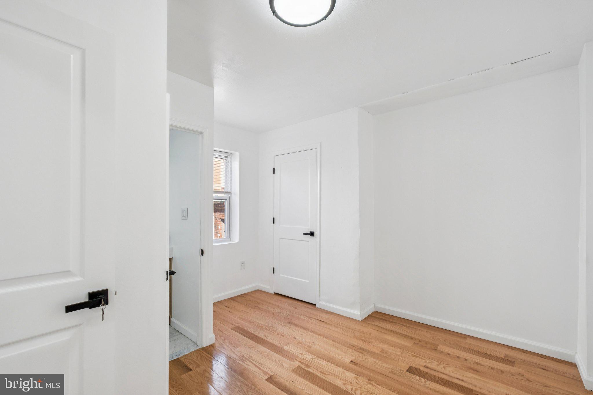 1223 Spruce Street, Unit 3F Philadelphia, PA 19107 - Photo 10 of 37 a view of room with wooden floor