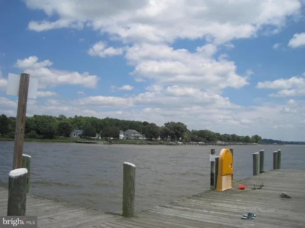 a view of balcony with furniture