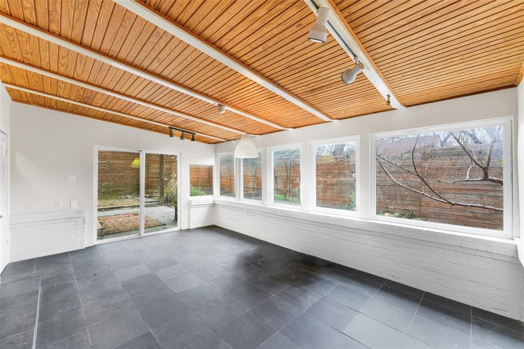 311 North Tennant Street Dallas, TX 75208 - Photo 15 of 23 a view of an empty room with a window