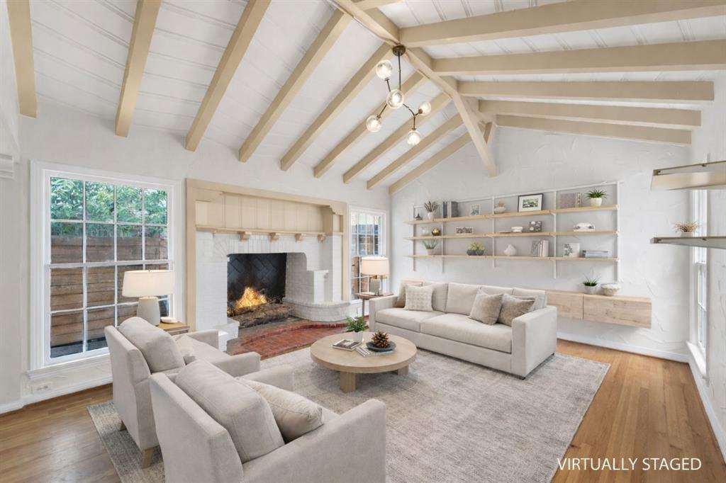 311 North Tennant Street Dallas, TX 75208 - Photo 4 of 23 a living room with furniture and a fireplace