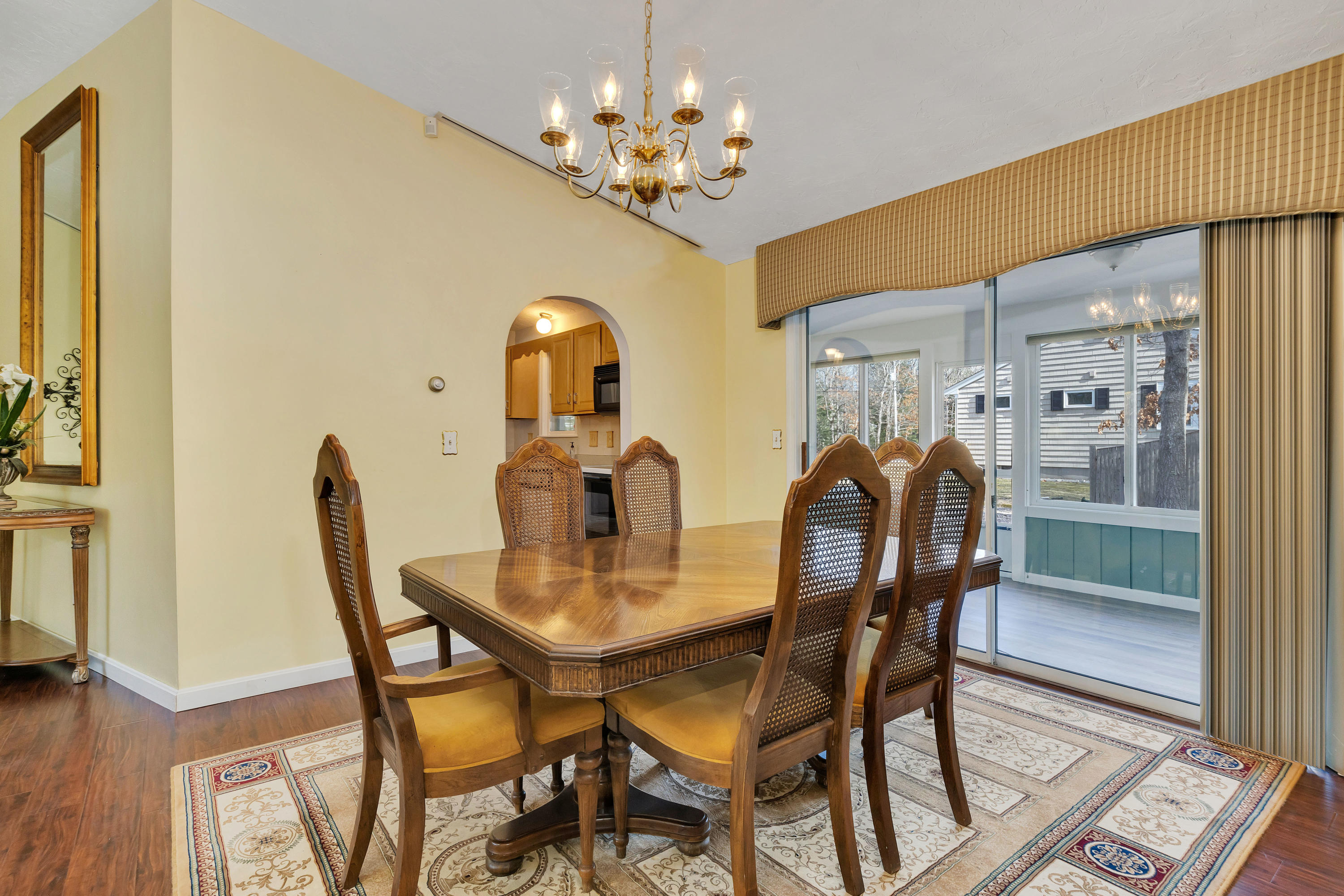 140 Thistle Drive Centerville, MA 02632 - Photo 11 of 46 a dining room with furniture and chandelier