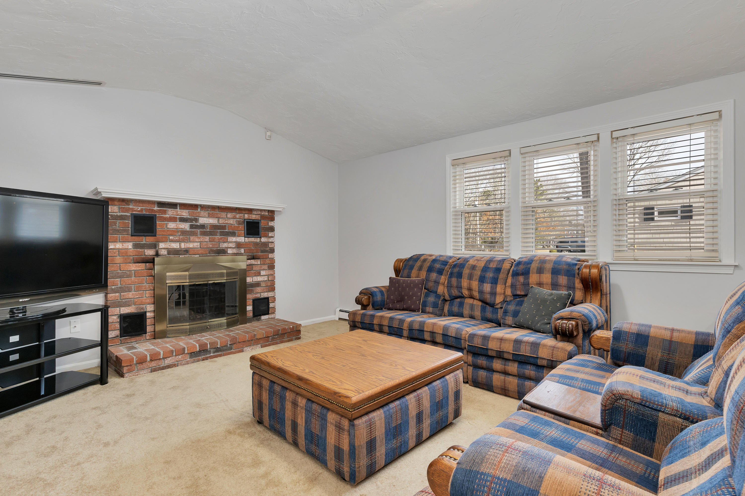 140 Thistle Drive Centerville, MA 02632 - Photo 19 of 46 a living room with furniture and a flat screen tv
