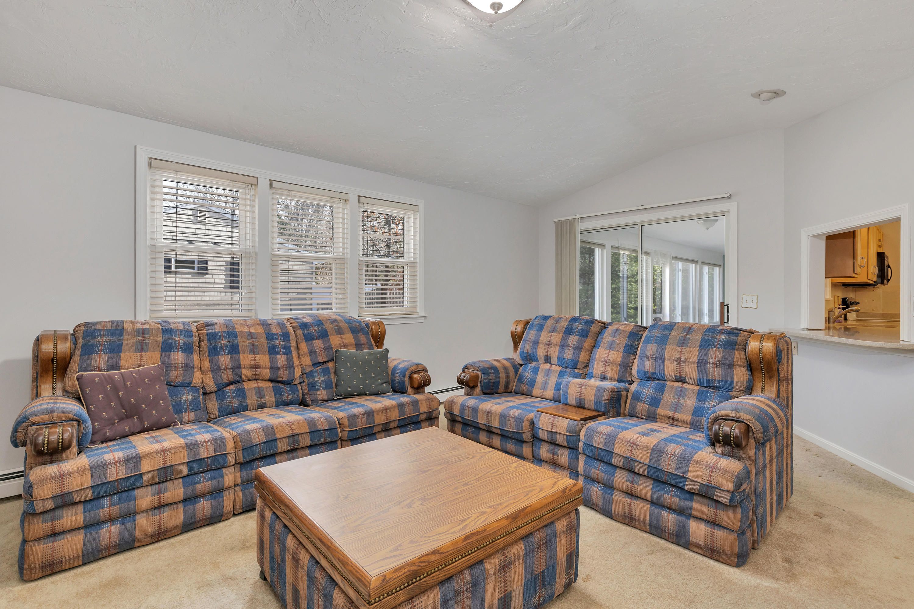 140 Thistle Drive Centerville, MA 02632 - Photo 21 of 46 a living room with furniture and a window