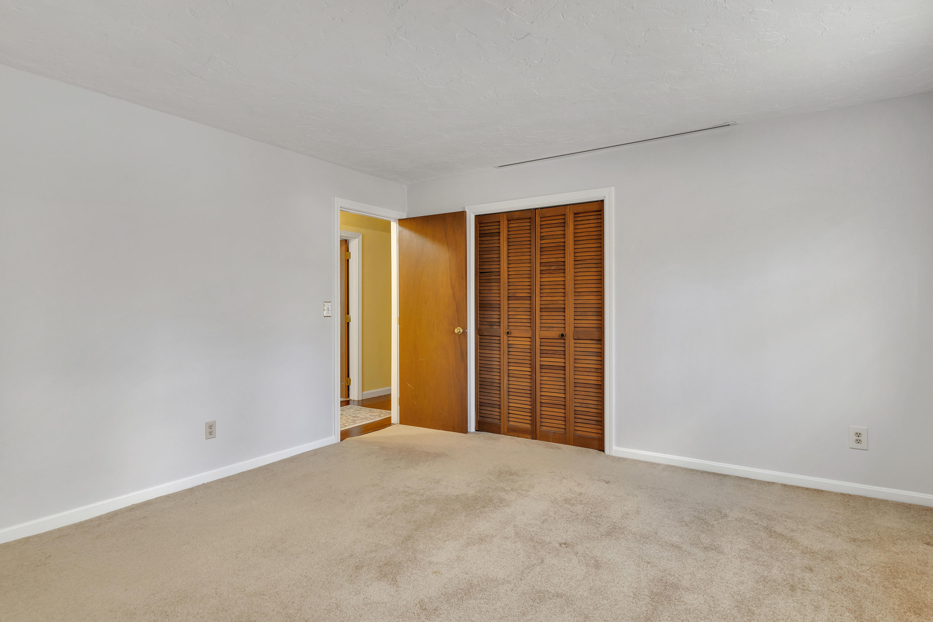 140 Thistle Drive Centerville, MA 02632 - Photo 23 of 46 an empty room with closet area
