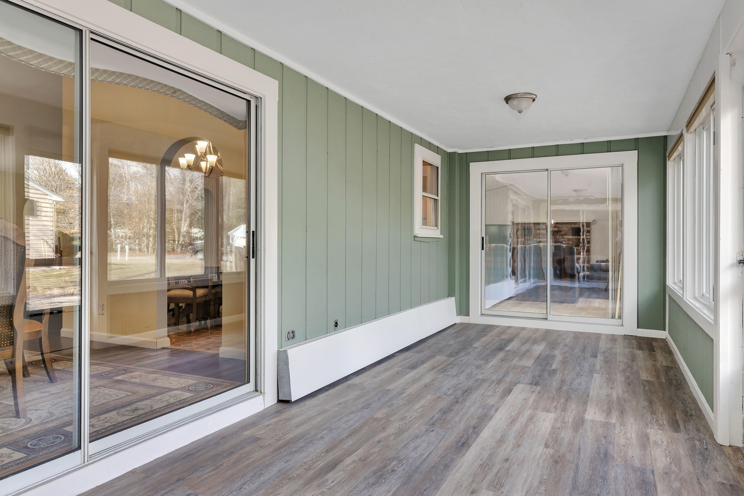 140 Thistle Drive Centerville, MA 02632 - Photo 34 of 46 a view of an entryway of wooden floor and a window