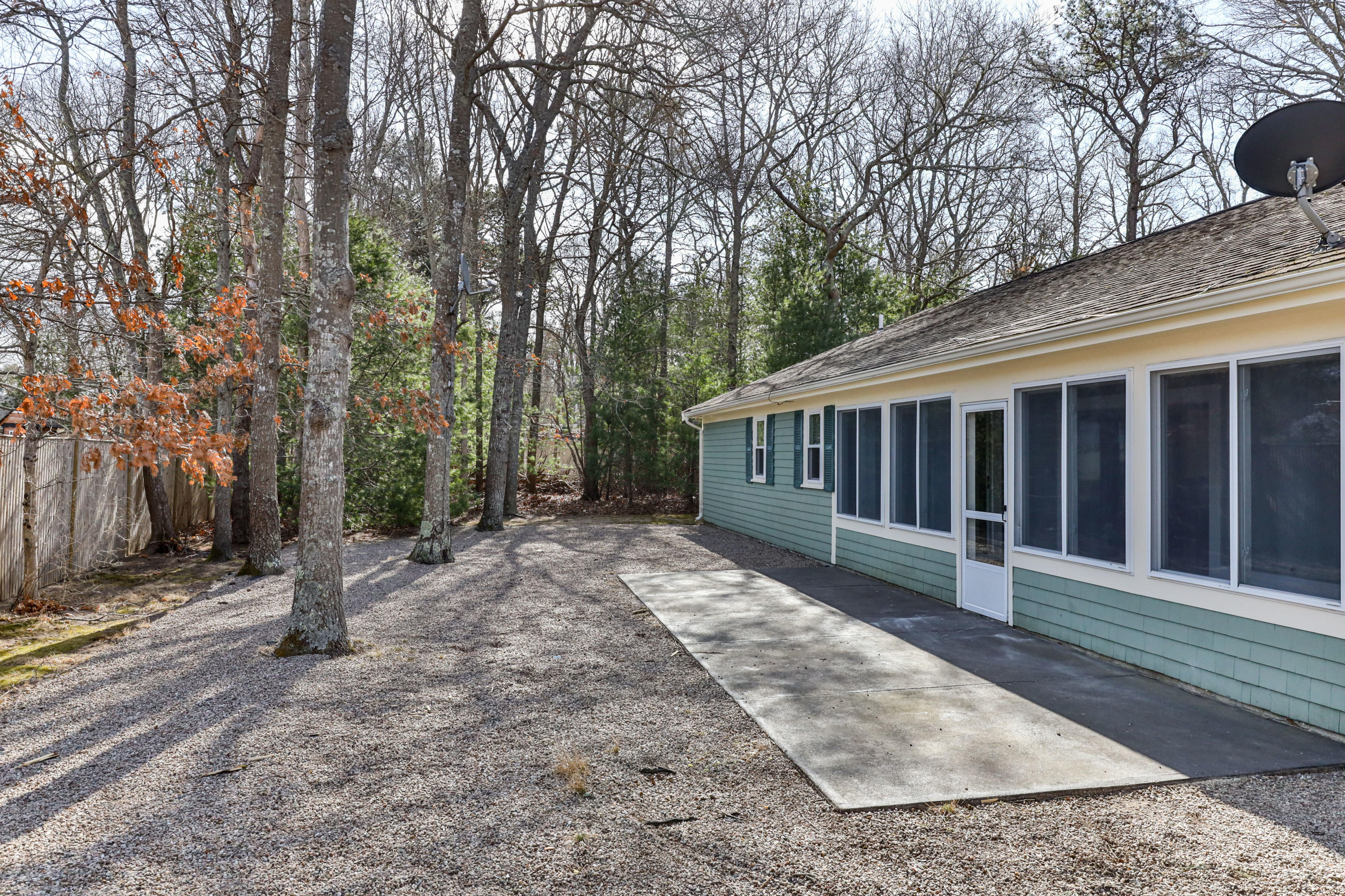 140 Thistle Drive Centerville, MA 02632 - Photo 41 of 46 a view of a house with a yard