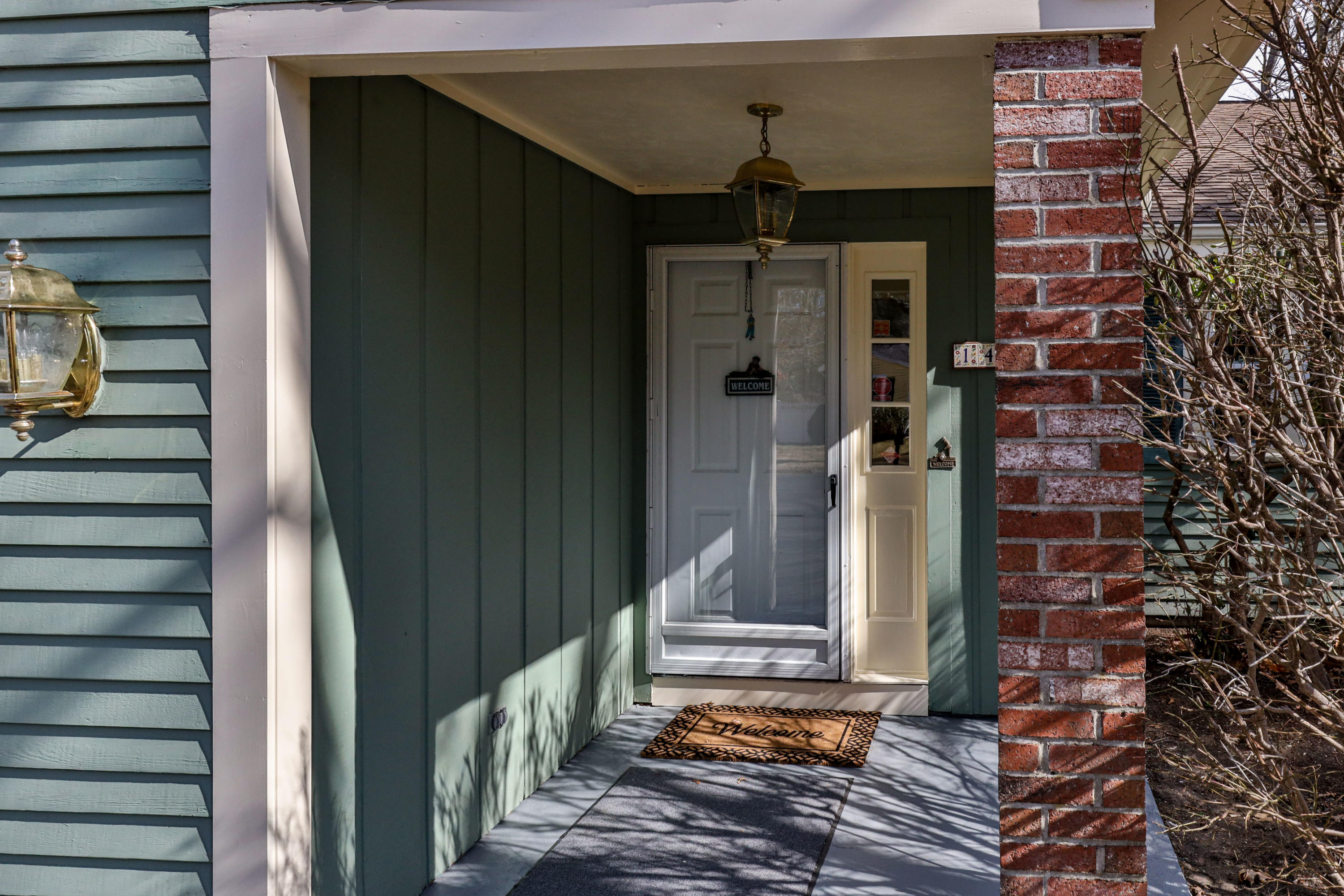 140 Thistle Drive Centerville, MA 02632 - Photo 6 of 46 a picture of a door of the house