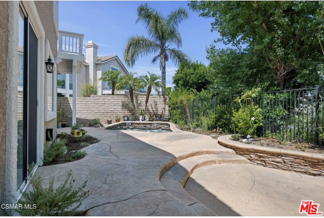 335 Kitetail Street Simi Valley, CA 93065 - Photo 14 of 37 a house view with a garden space