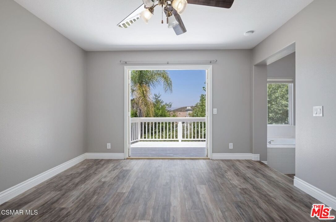 335 Kitetail Street Simi Valley, CA 93065 - Photo 23 of 37 wooden floor in an empty room with a window