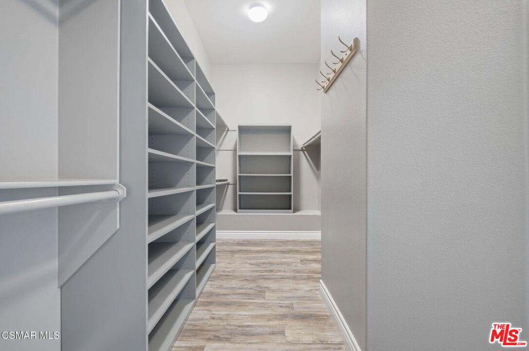 335 Kitetail Street Simi Valley, CA 93065 - Photo 25 of 37 a view of walk in closet with empty racks