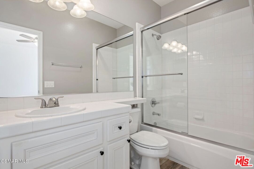 335 Kitetail Street Simi Valley, CA 93065 - Photo 27 of 37 a bathroom with a sink toilet and shower