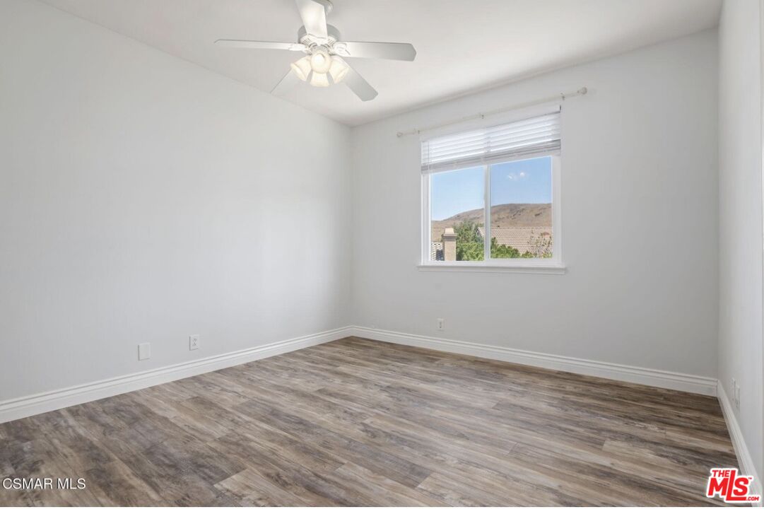 335 Kitetail Street Simi Valley, CA 93065 - Photo 28 of 37 a view of an empty room with a window