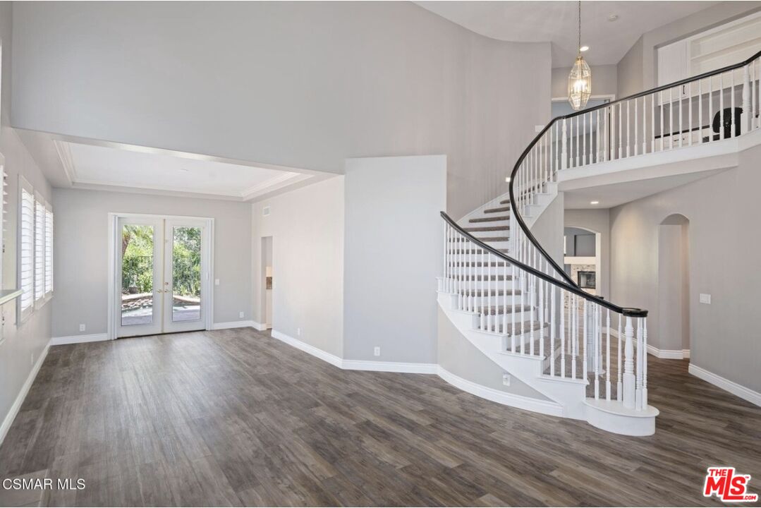 335 Kitetail Street Simi Valley, CA 93065 - Photo 3 of 37 a view of an entryway with wooden floor