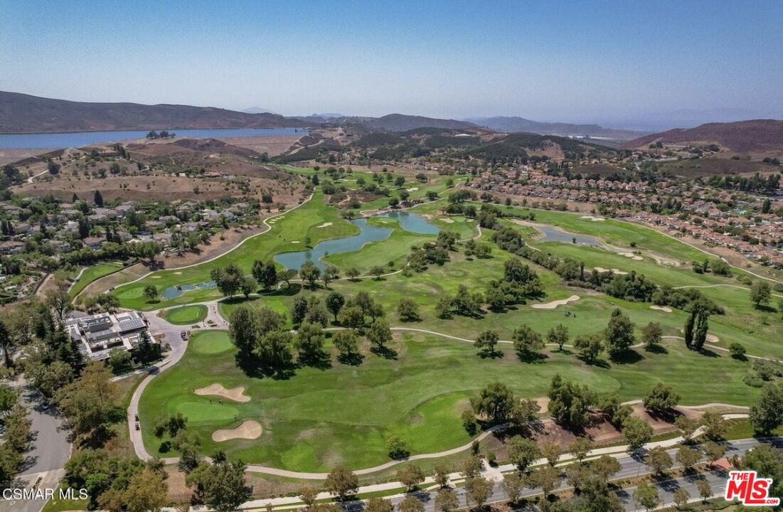 335 Kitetail Street Simi Valley, CA 93065 - Photo 36 of 37 a view of a lush green hillside and houses