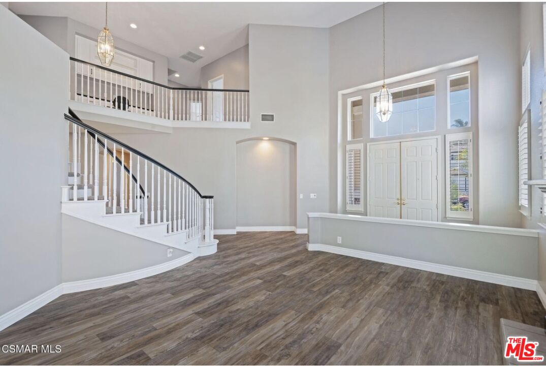 335 Kitetail Street Simi Valley, CA 93065 - Photo 4 of 37 wooden floor in an empty room with a window