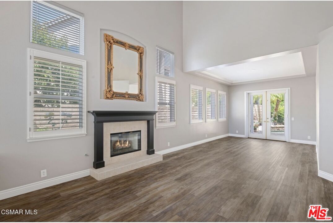 335 Kitetail Street Simi Valley, CA 93065 - Photo 5 of 37 a view of an empty room with a window and fireplace