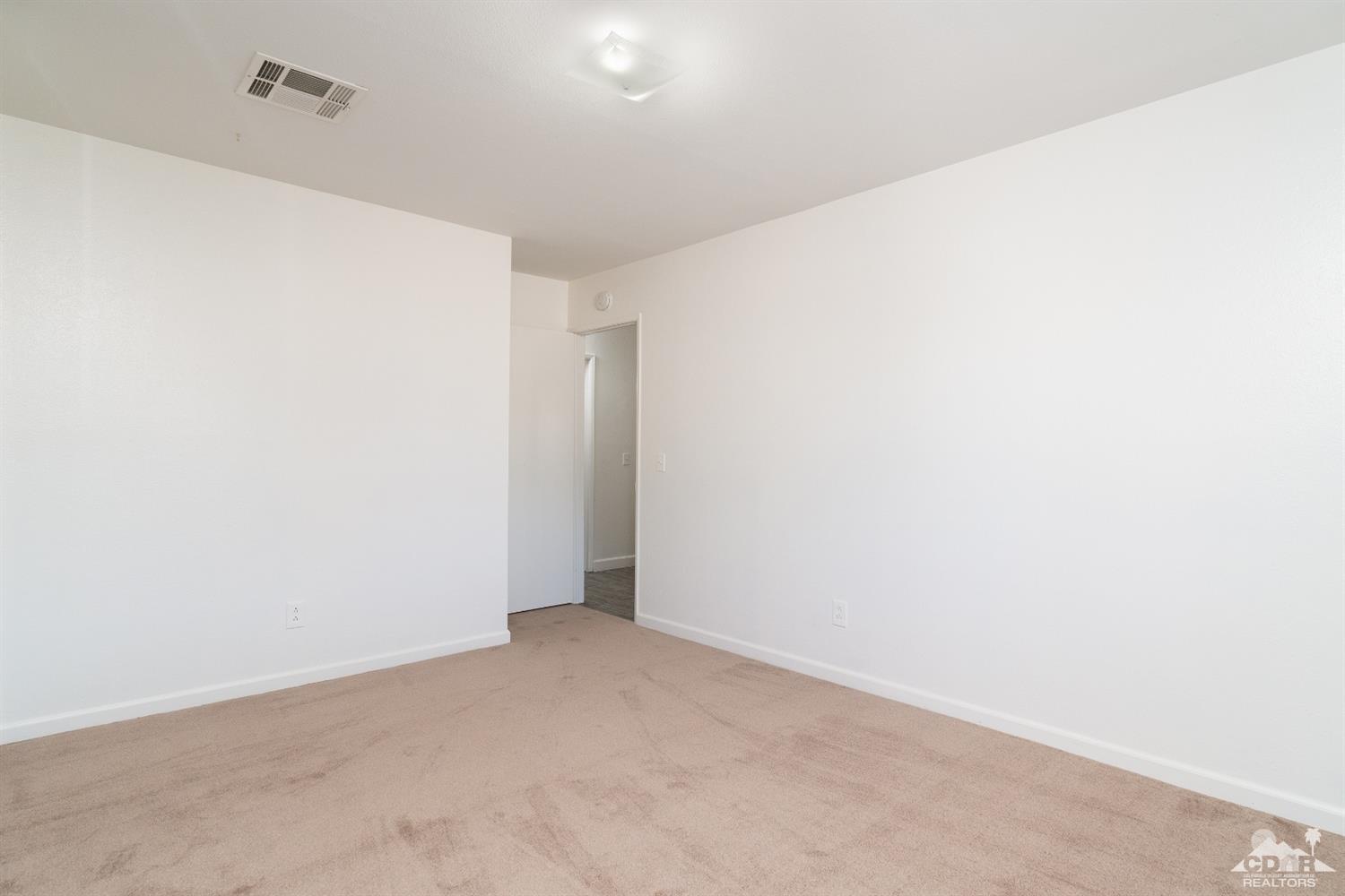 66186 Santa Rosa Road Desert Hot Springs, CA 92240 - Photo 16 of 23 a view of an empty room