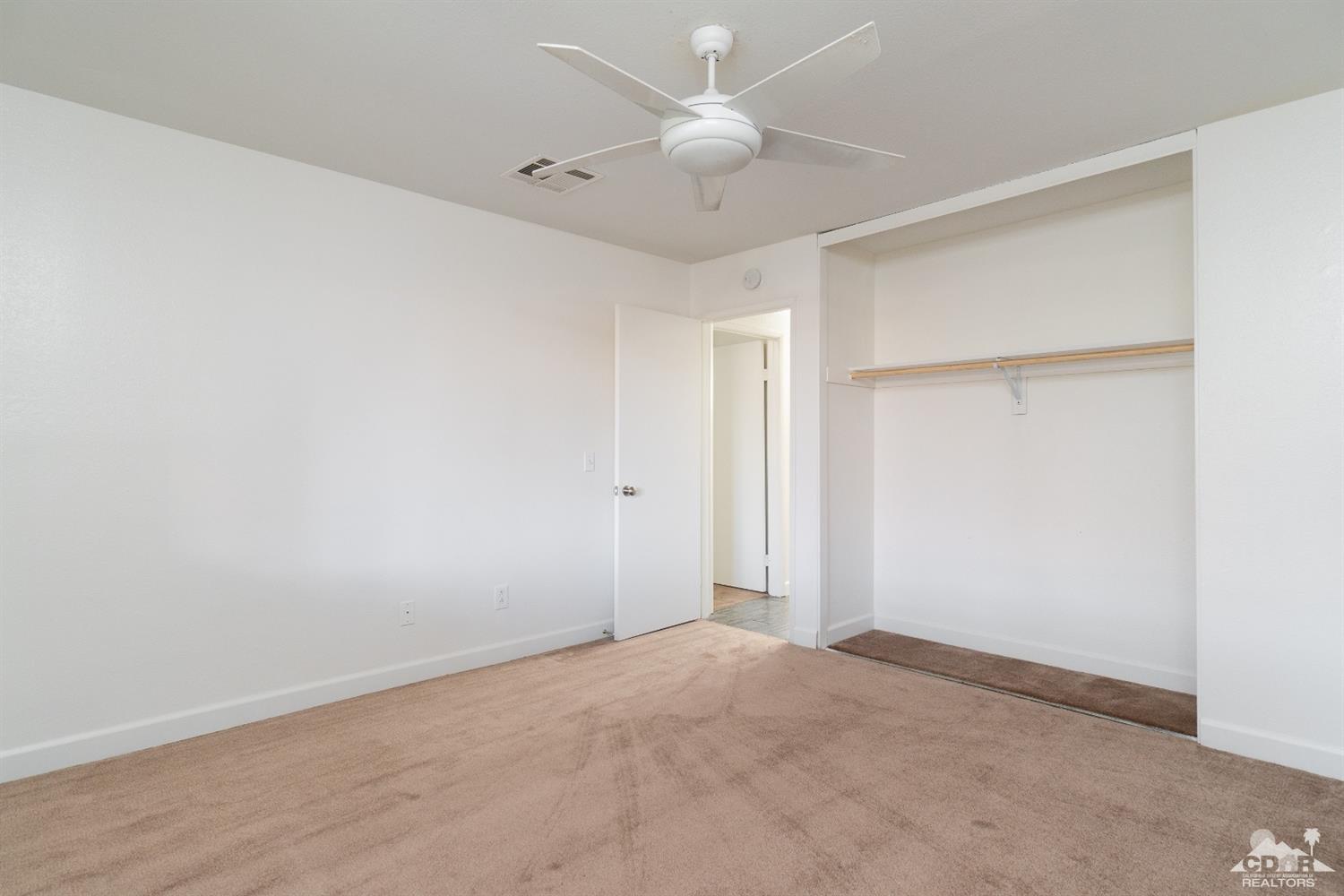66186 Santa Rosa Road Desert Hot Springs, CA 92240 - Photo 18 of 23 a view of an empty room