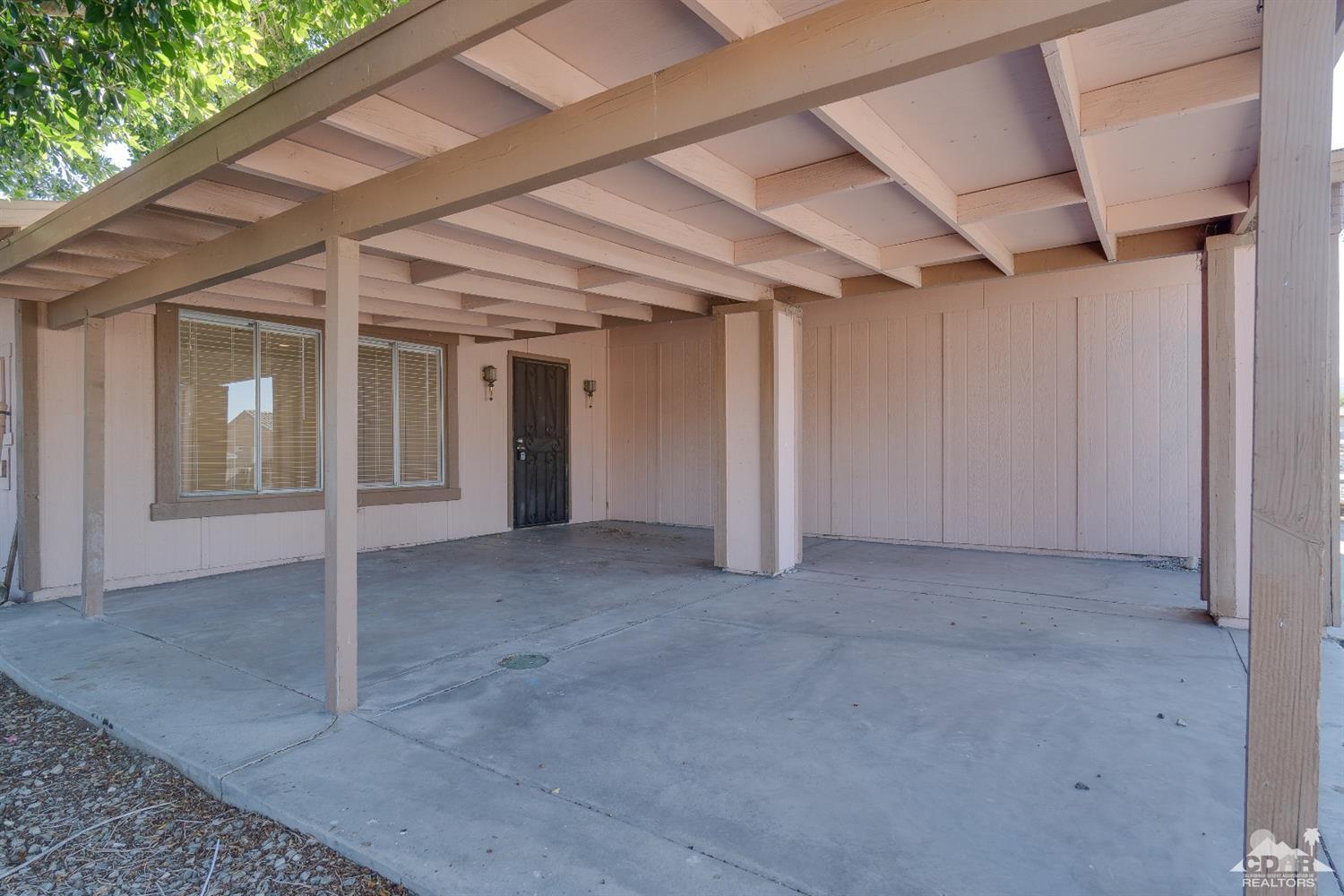 66186 Santa Rosa Road Desert Hot Springs, CA 92240 - Photo 20 of 23 a view of empty room with ceiling fan