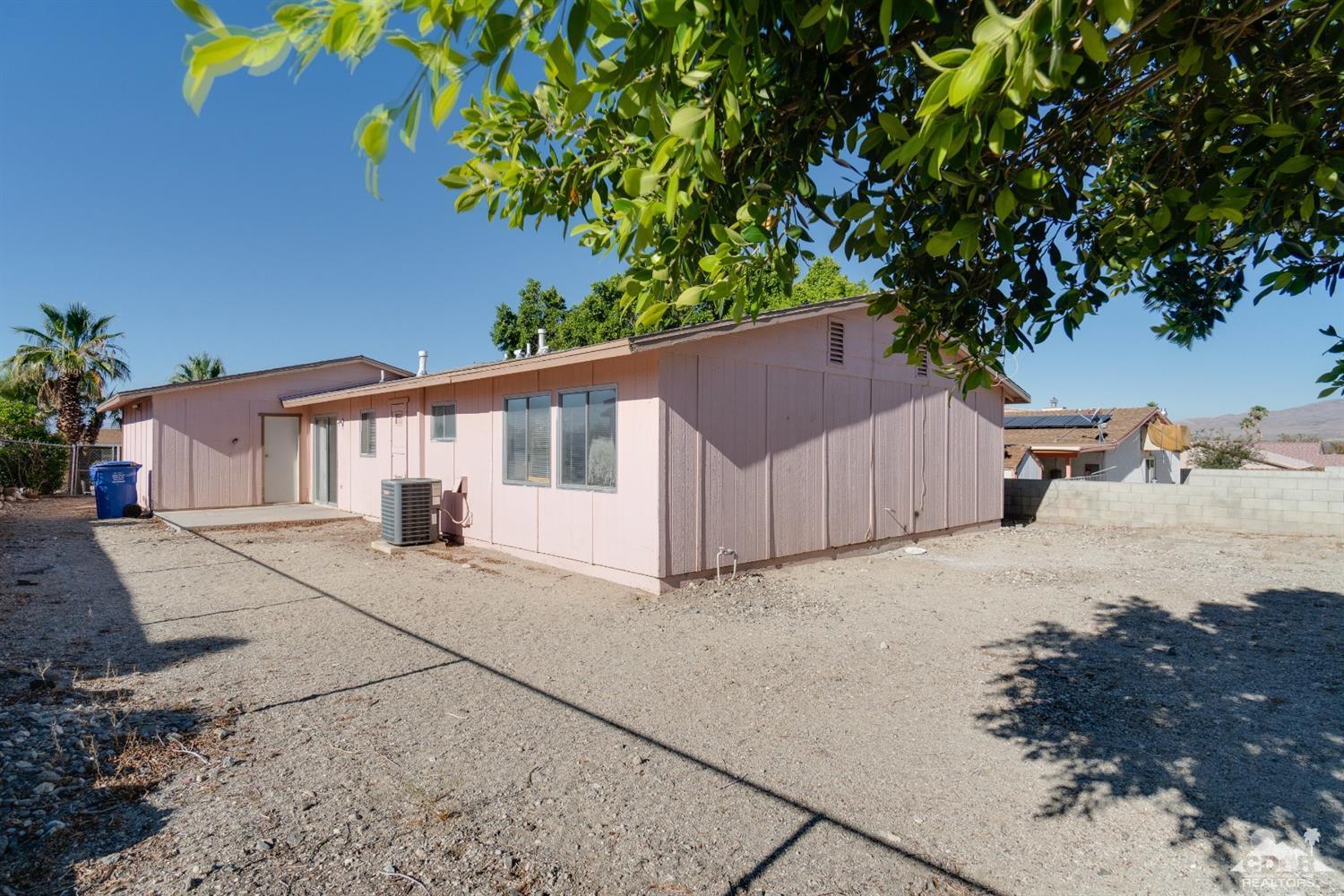 66186 Santa Rosa Road Desert Hot Springs, CA 92240 - Photo 22 of 23 a view of a house with a tree
