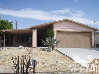 66186 Santa Rosa Road Desert Hot Springs, CA 92240 - Photo 23 of 23 a view of a house with a yard