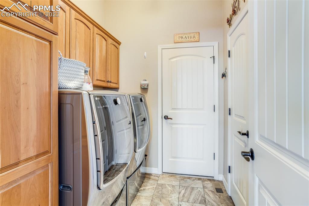 13214 Cake Bread Heights Colorado Springs, CO 80921 - Photo 10 of 28 a view of a bathroom with a bathtub and a window