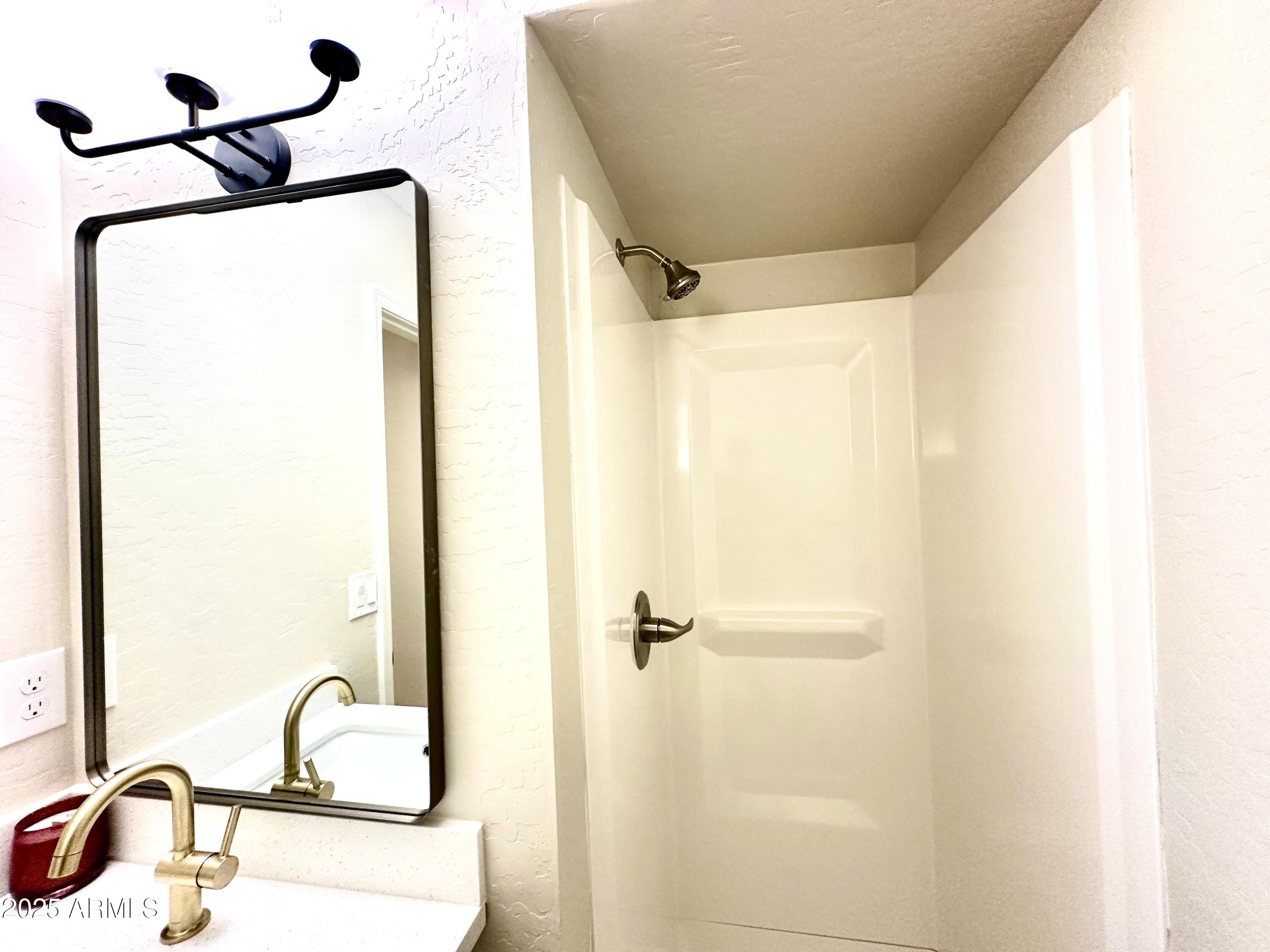 1188 North 4th Street Coolidge, AZ 85128 - Photo 11 of 26 a bathroom with a sink