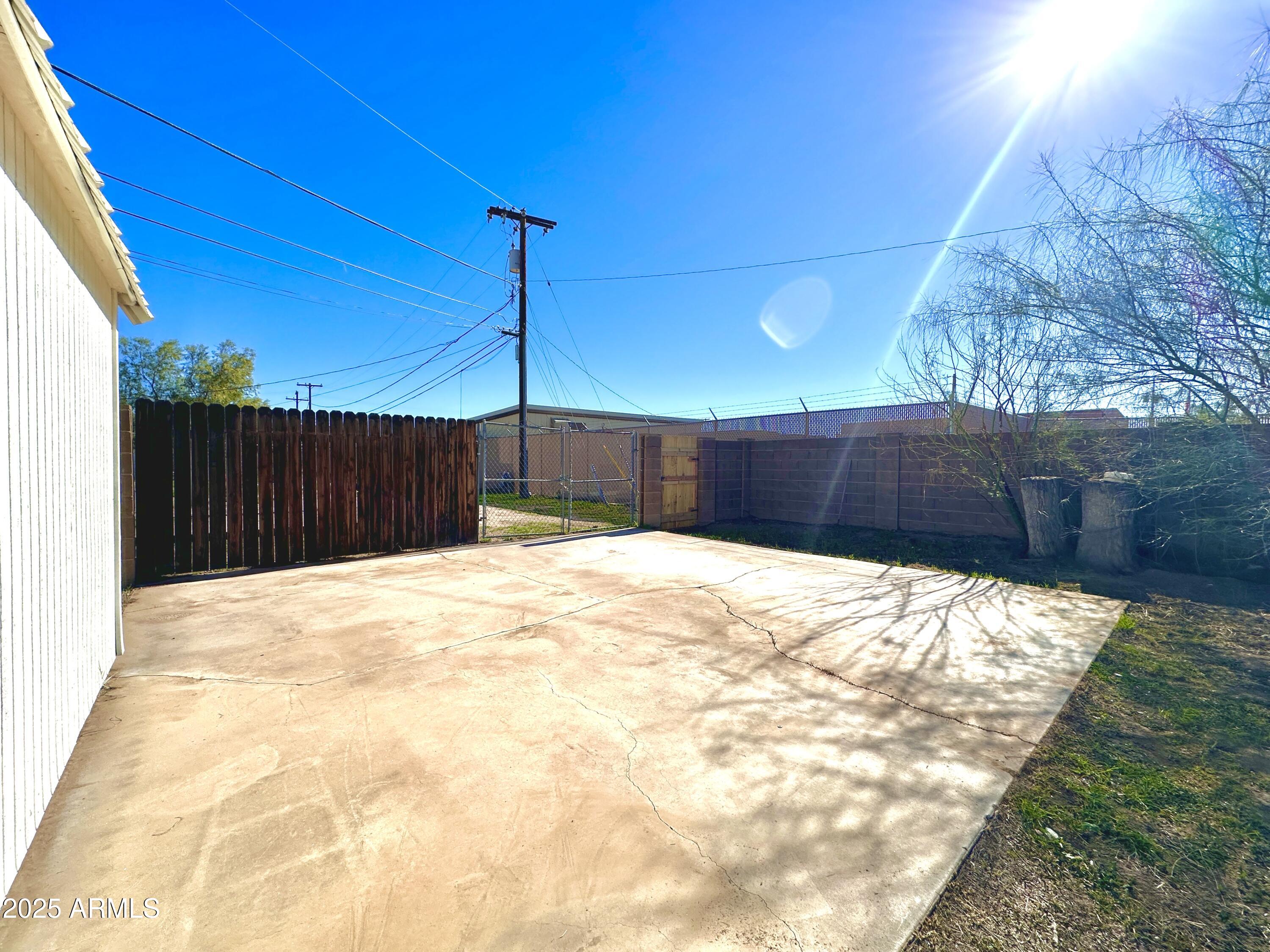 1188 North 4th Street Coolidge, AZ 85128 - Photo 23 of 26 a view of a backyard