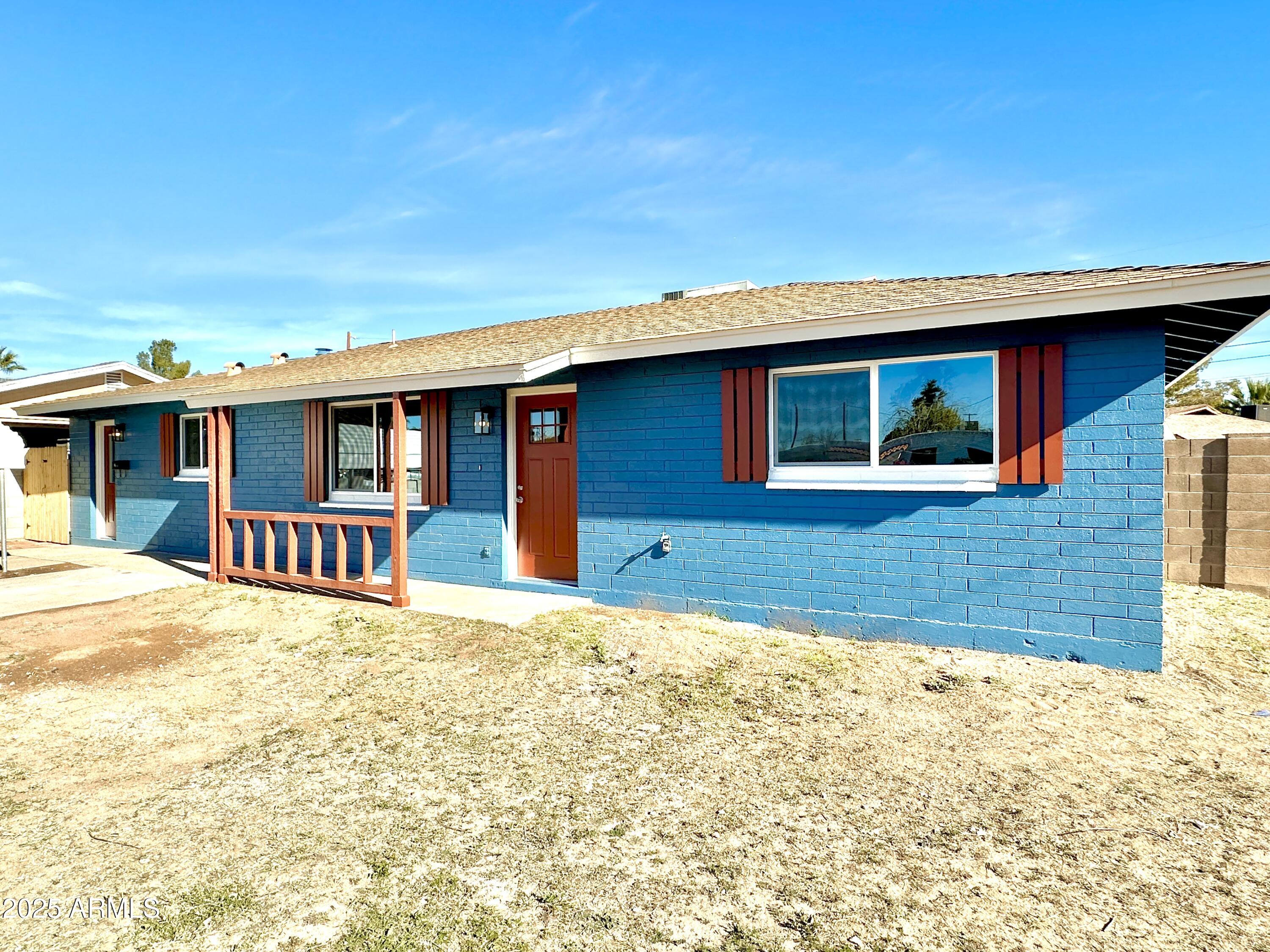 1188 North 4th Street Coolidge, AZ 85128 - Photo 3 of 26 a house with yard in front of it
