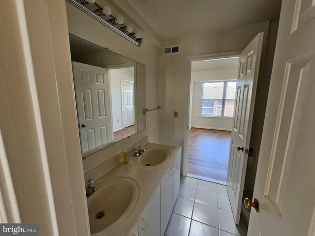 a bathroom with a bathtub and a toilet