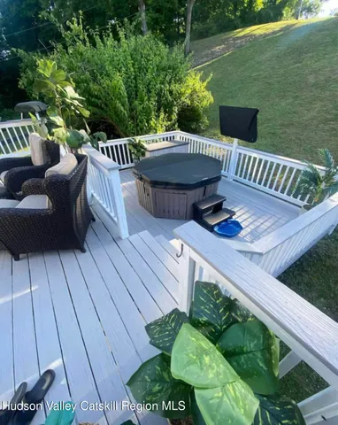 a view of a patio in backyard of the house