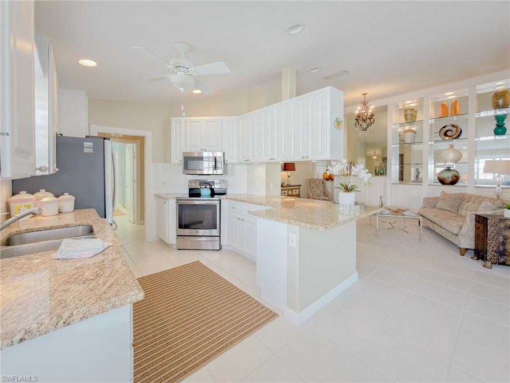 3356 Cayman Lane Naples, FL 34119 - Photo 17 of 46 Pull up a bar stool and keep the chef company