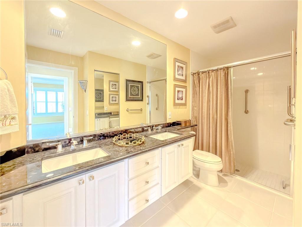 3356 Cayman Lane Naples, FL 34119 - Photo 29 of 46 ** Dual sinks, large step in shower